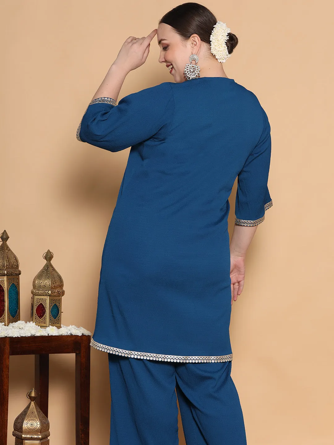 Blue Textured Short Kurti - Embellished